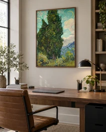 Photo 3: framed above a wood desk with a leather chair